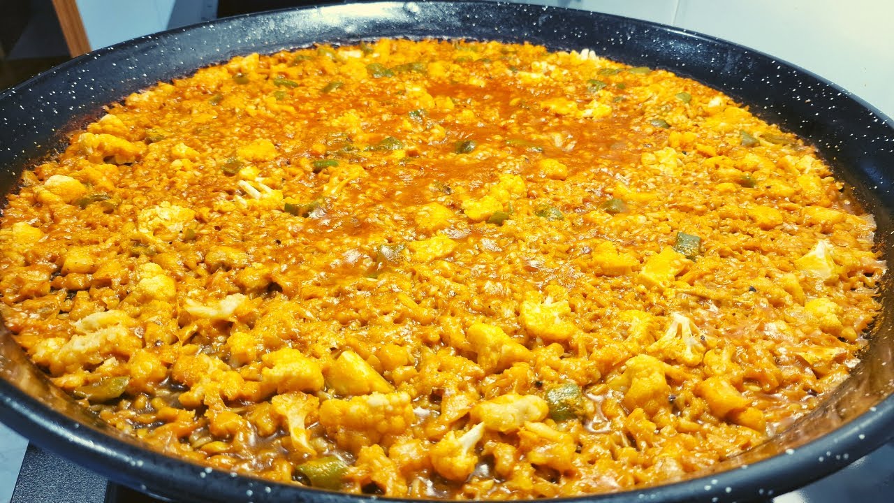 Paella de bacalao y col